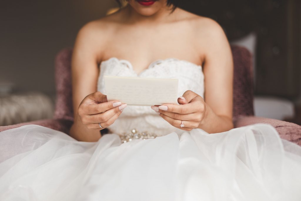Jodi and Jade wedding photography Dublin Wexford bride reading letter