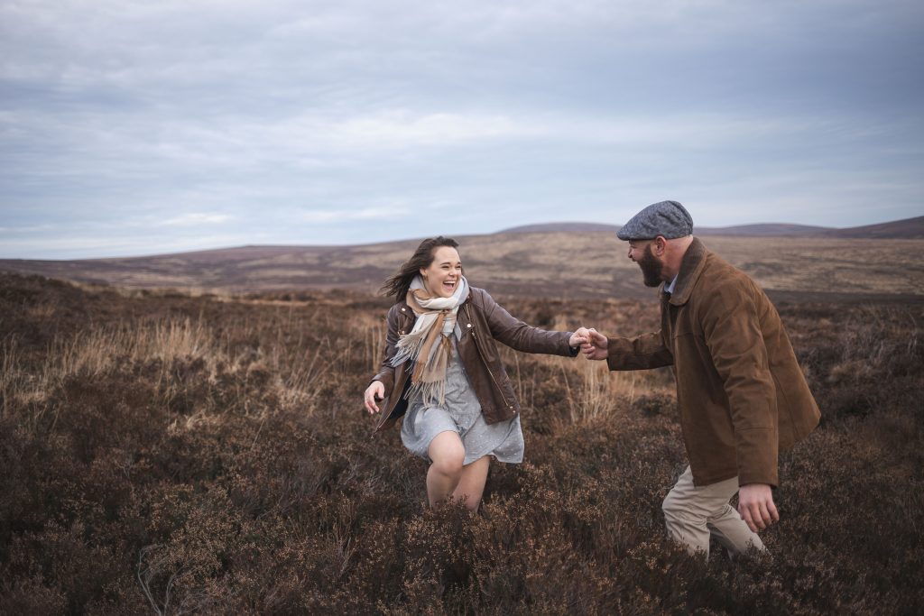 Marli + Andre wicklow mountains engagement shoot couple laughing