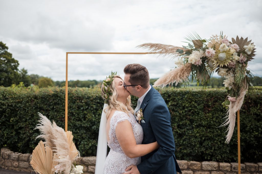 Jack and Katie Antrim Elopement covid zoom wedding photography first kiss