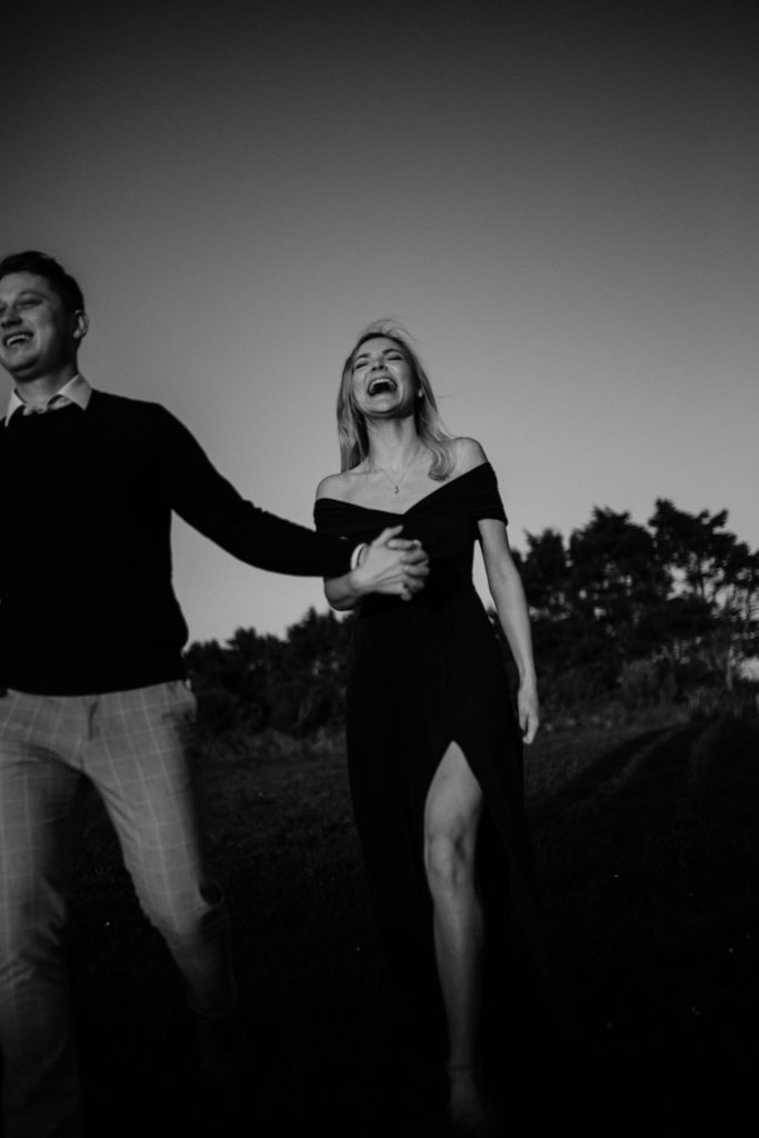 Aine + Slavik Howth Engagement Session laughing glamour