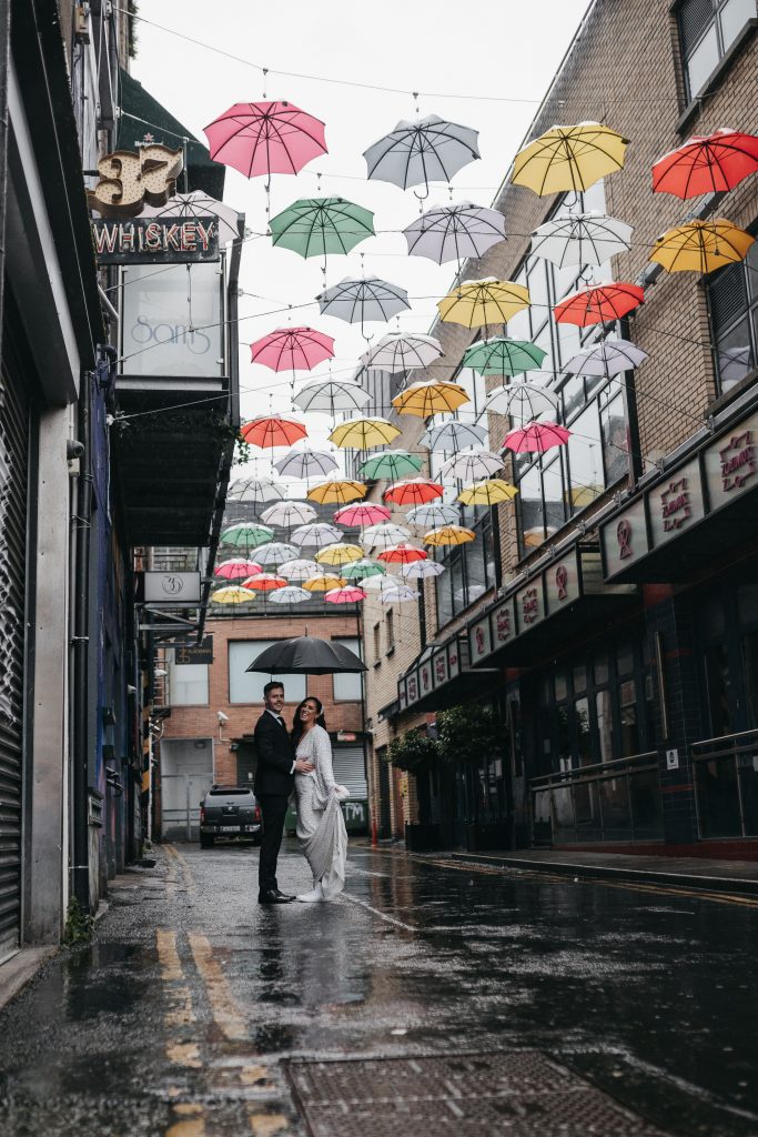Troy and Laura Dublin City intimate Wedding under the Dublin umbrellas