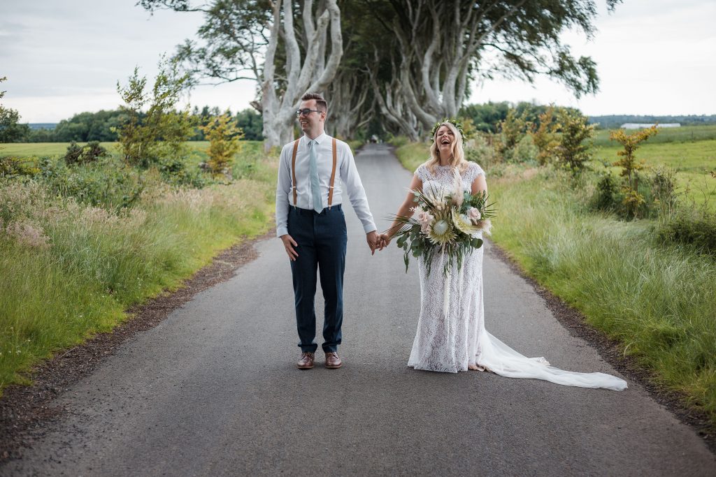 Jack and Katie Dark hedges Elopement wedding photography laughing hard